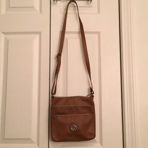 Adjustable cross body purse